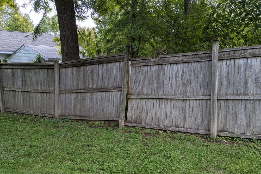 Weathered damaged wooden fence before STN Property Services replacement